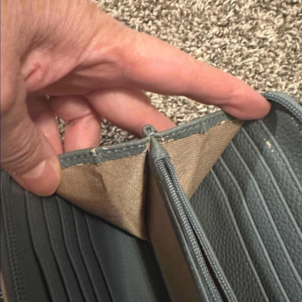 The Sak Iris crossbody wallet in dusty blue leather with navy and ivory trim. - Picture 7 of 9